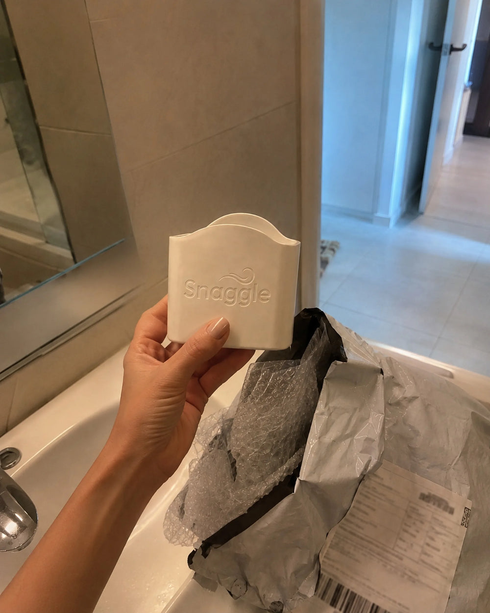 The first curved Snaggle prototype held up in the bathroom